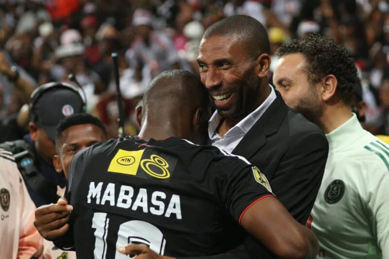 Orlando Pirates head coach Abdeslami Ouaddou embraces Tshegofatso Mabasa after the latter scored Pirates' second goal. > Photo: Blake Linder